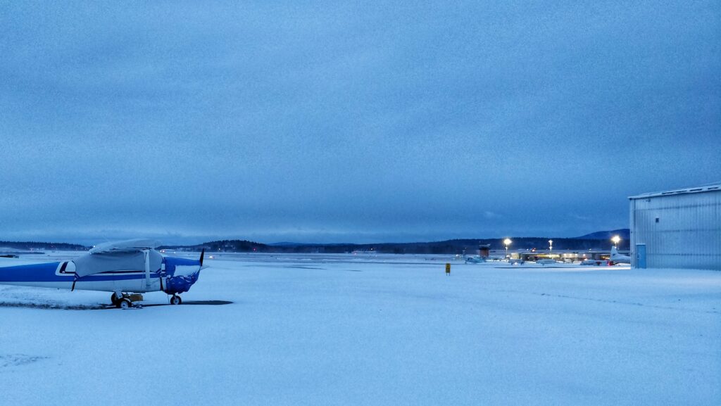 Snow with low ceilings over the airport. Welcome Winter.