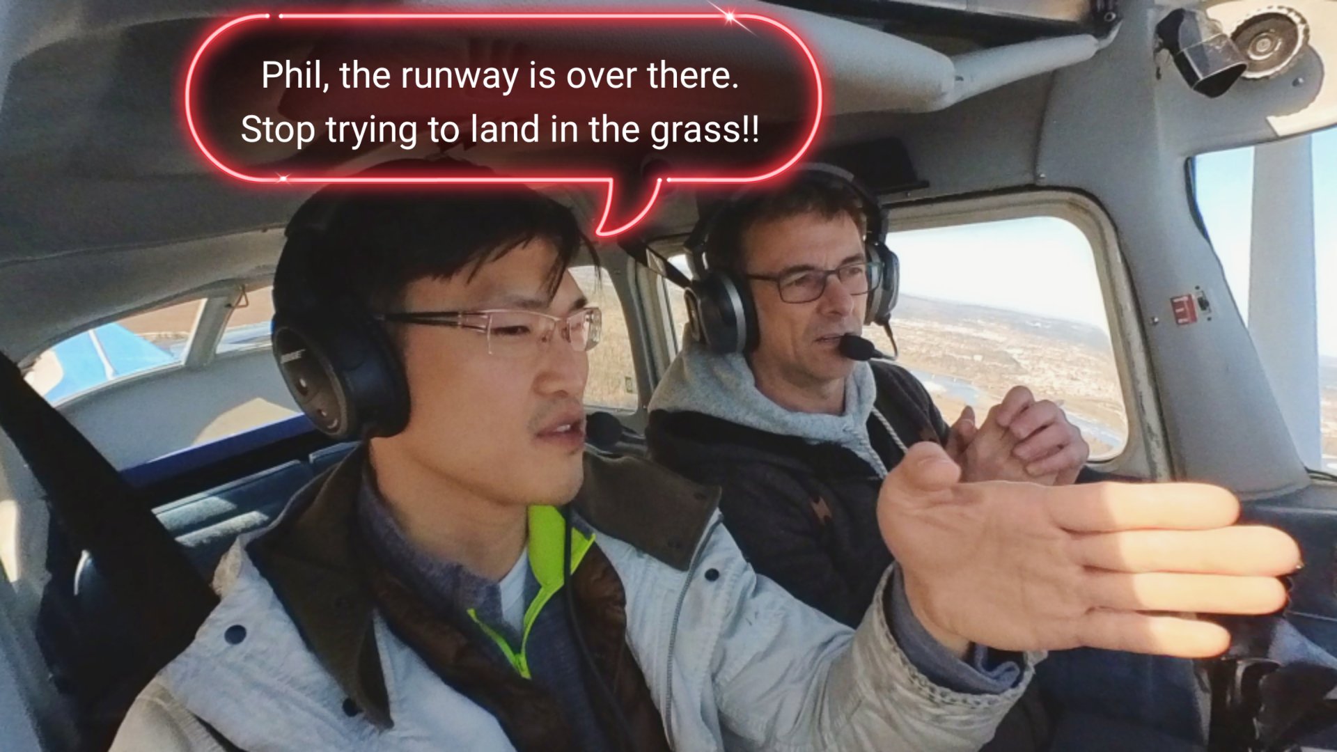 Flight instructor explaining how to land the airplane.